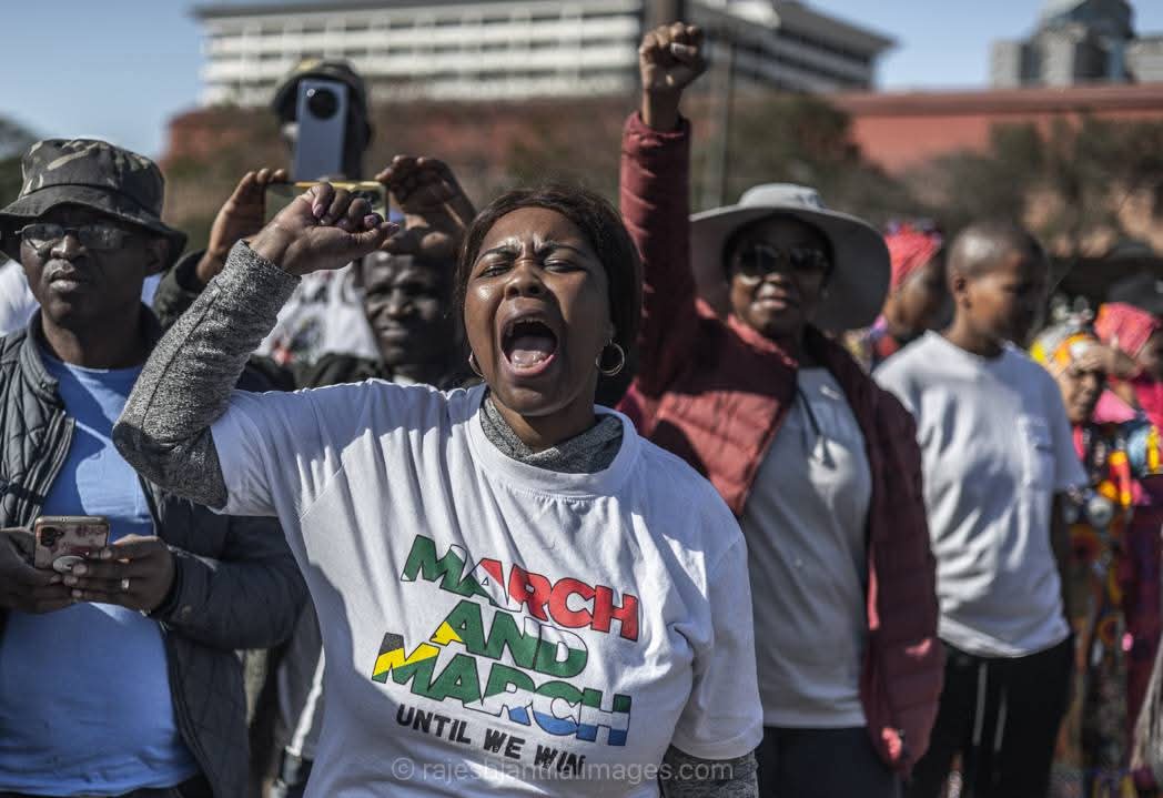 Protesters gather in South African streets as tensions rise between local communities and foreign nationals, reflecting deeper economic and social challenges.
