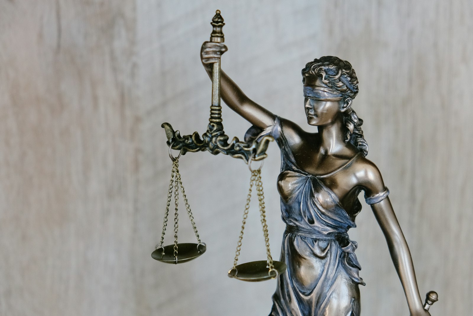 Scales of justice representing Nigeria’s trial of five alleged Ansaru members