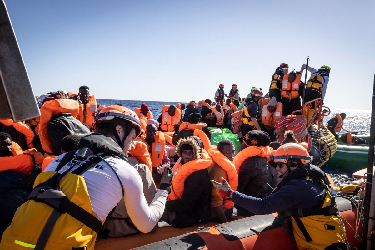Rescue vessel assisting migrants in the central Mediterranean