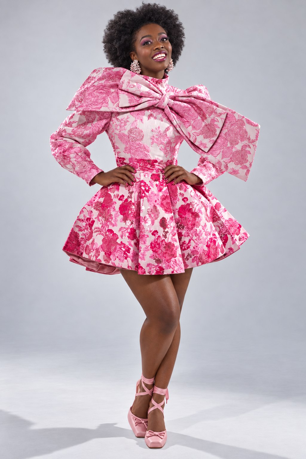 Editorial illustration of Korma Aguh-Stuckmayer wearing a pink floral jacquard dress in a studio setting.
